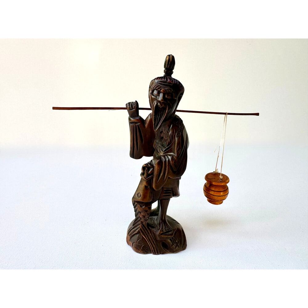 Title: Vintage Hand Carved Wood Fisherman Figure With Shoulder Pole